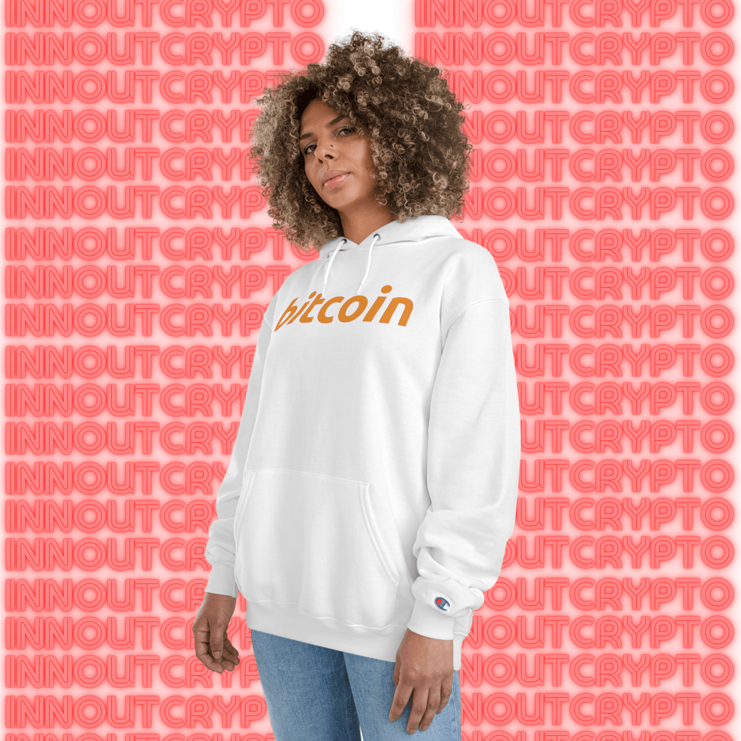 High-quality image showcasing the Bitcoin Premium collection at Innoutcrypto.com, featuring embroidered and printed Bitcoin apparel including polos, hoodies, and athletic shirts.